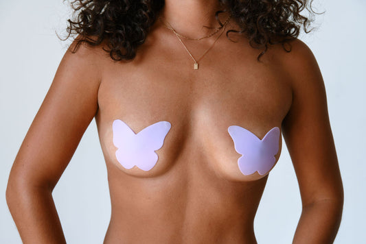 Purple butterfly-shaped reusable silicone nipple cover for discreet, stylish, and comfortable coverage