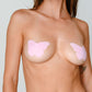 "Light pink butterfly-shaped silicone nipple cover for discreet, stylish, and comfortable coverage. Reusable and ultra-thin for confident fashion."